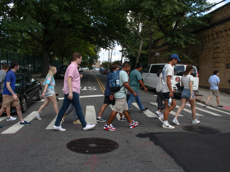 students walking across the street