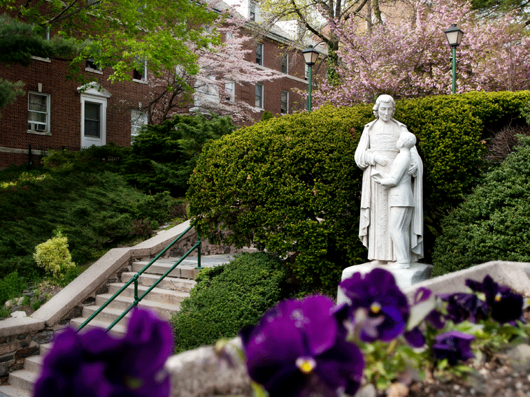 De La Salle statue in spring