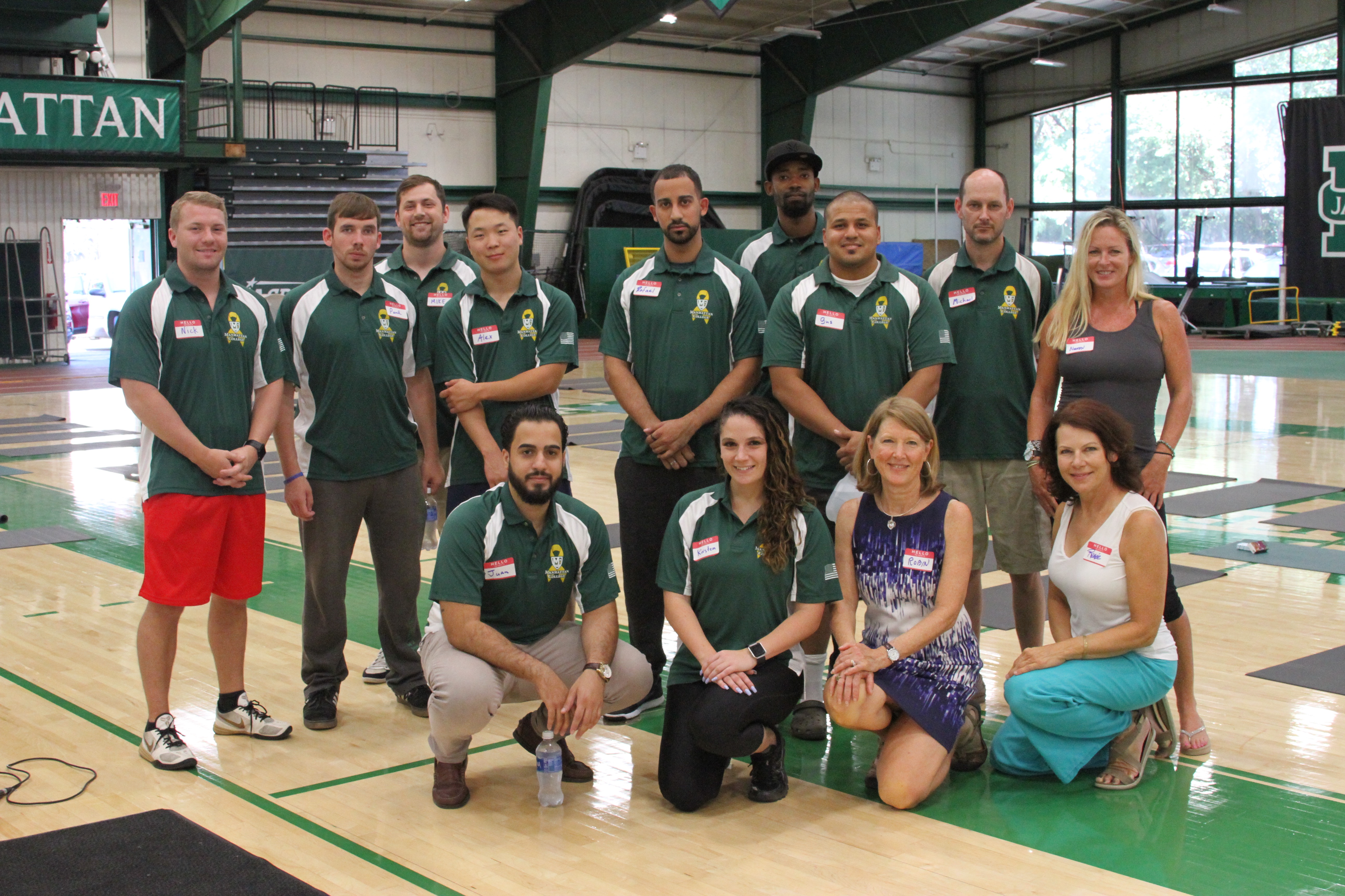 Veterans pose for a picture after a yoga class