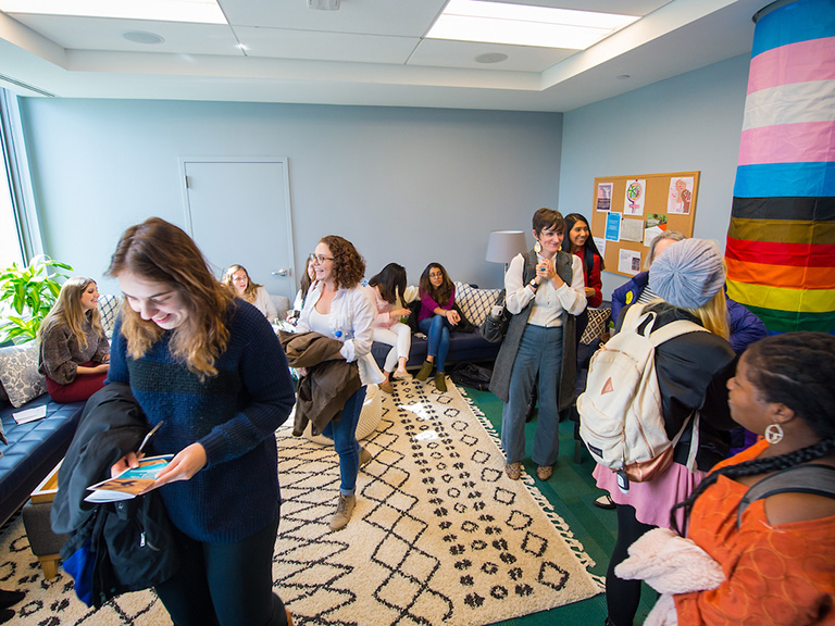 group of women in room talking together