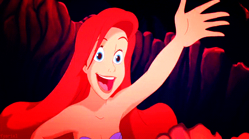 Ariel from the Little Mermaid waving happily.