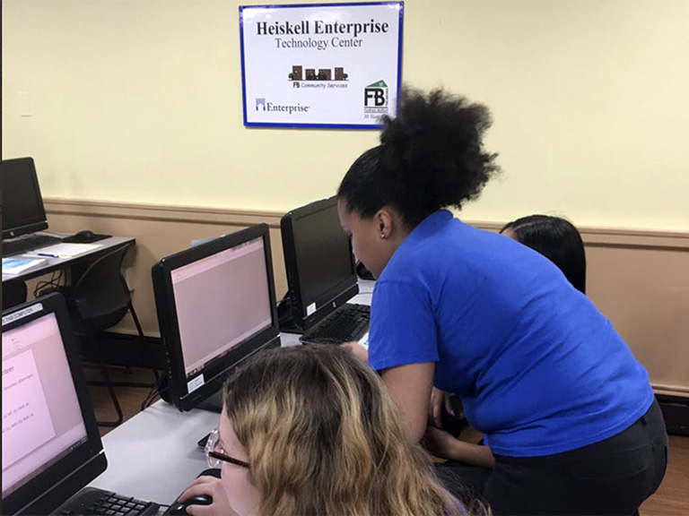 Volunteers at UNHP assisting with tax returns