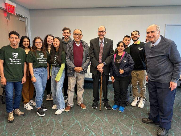 Photo of President Riverso and Columbia exchange students and faculty