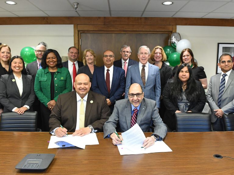 Manhattan College and Rockland Community College President's signing the Articulation Agreement