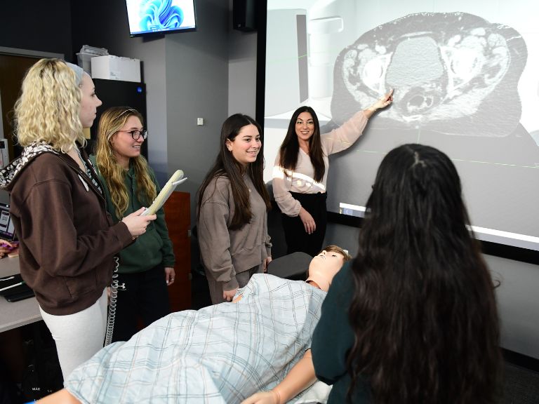 Angela Oliveira, alum and Chair of Radiologic Health Professions teaching students